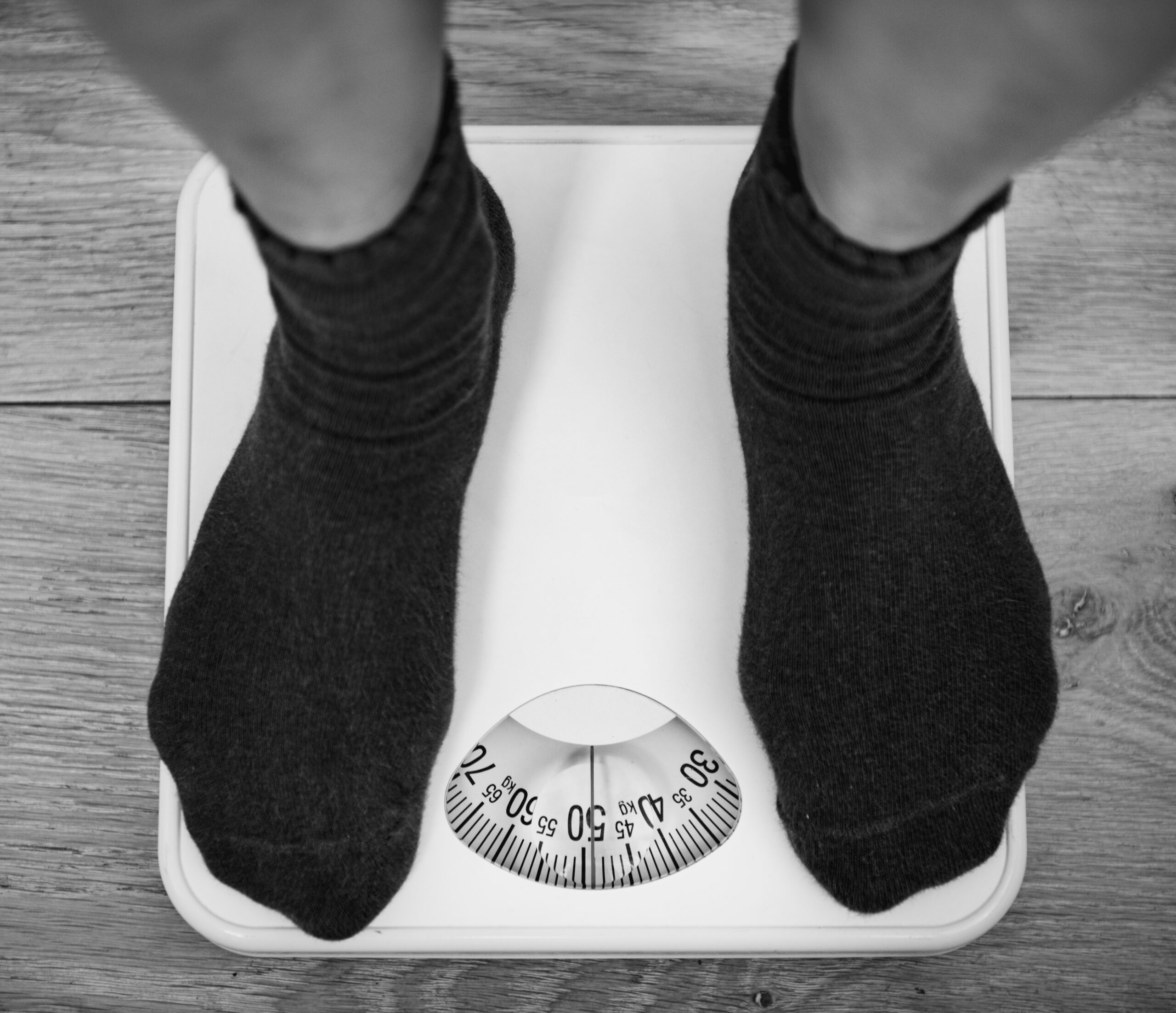 woman on a weight scale
